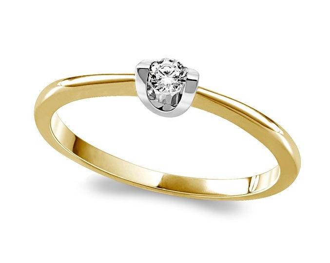 Bague 4856,avec 1 diamant 4 points.