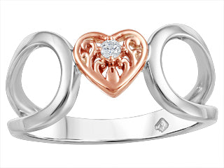 Bague argent et or sertie d'un diamant Canadien de 3 points.
