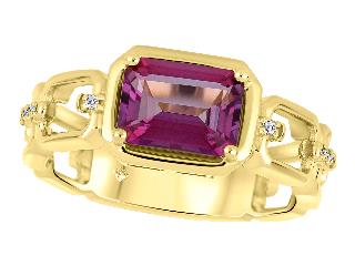 Bague en or jaune 10kt sertie d'un topaze rose et de diamants 3 points total